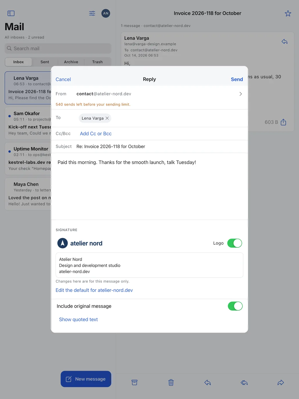 iPad: A reply from contact@ on the user's domain, with the domain's signature and logo.
